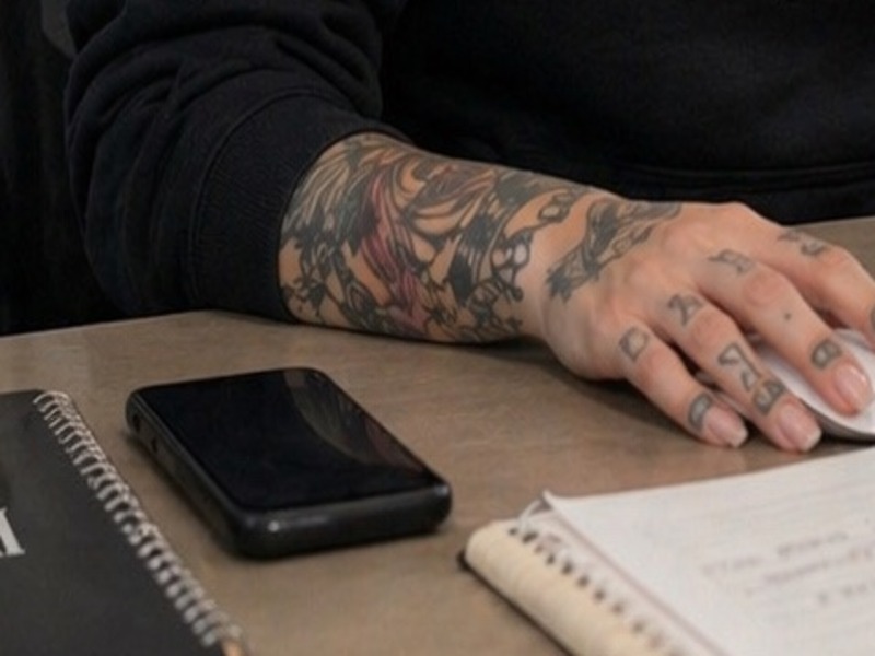 Notebook and phone on desk